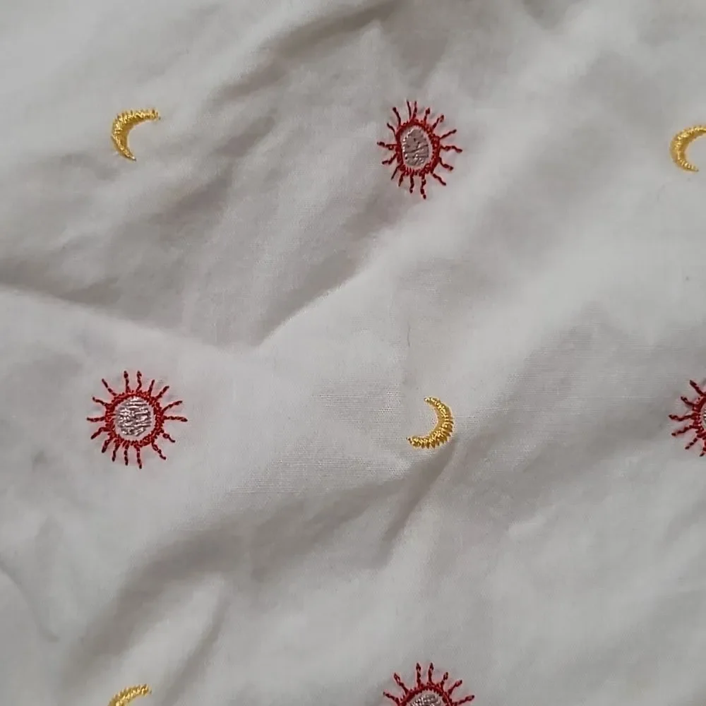 Smocked neck embroidered dress
